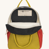 The organic cotton Fluf B-Pack Jr in carbon cactus, a kids school backpack, unzipped to show the name tag inside.