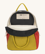 The organic cotton Fluf B-Pack Jr in carbon cactus, a kids school backpack, unzipped to show the name tag inside.