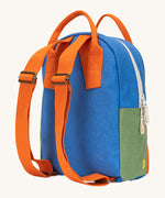 The back of The organic cotton Fluf B-Pack Jr in cobalt orange. a kids school backpack with orange coloured adjustable straps