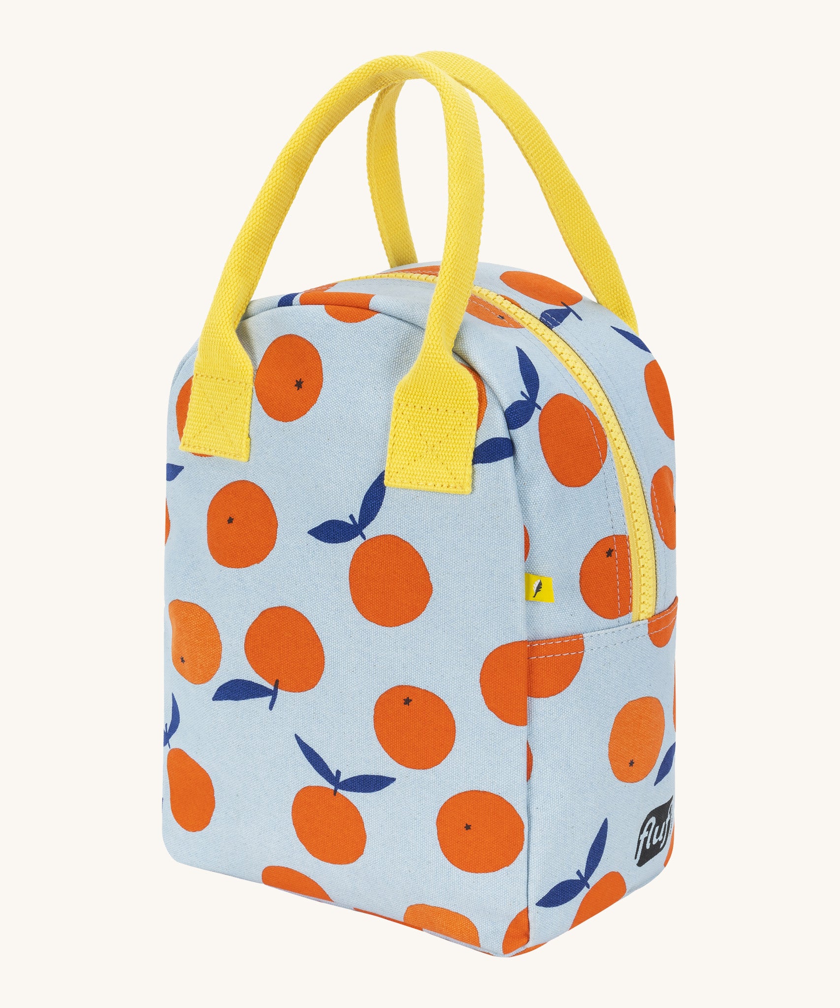 Side view of the Fluf zip lunch bag in light blue with a design of oranges with a yellow handle and zip detail