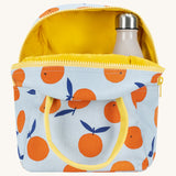 Fluf zip orange lunch bag in a light blue colour showing the yellow inner lining holding a bottle.