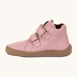 A side image of a Froddo barefoot Autumn children's shoe in pink available at Babipur showing the 2 velcro fastener for a secure fit, padded ankle and the dark brown grippy sole