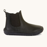 A side image of the Froddo barefoot kids leather school chelsea boots available at Babipur showing the side elastic and matching black sole detail