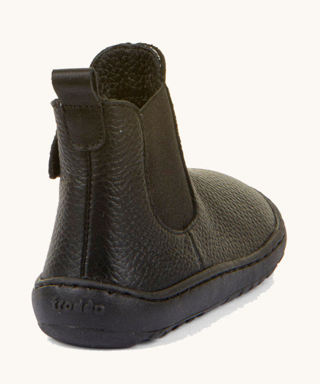 The back of the Froddo barefoot kids leather school chelsea boots available at Babipur showing the pull tab detail on the back of the boot