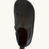 A top down image of the Froddo barefoot kids leather school chelsea boots available at Babipur showing the pull tab and insole detail