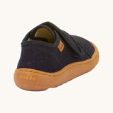 The back of the Froddo barefoot kids slipper in dark blue available at Babipur showing the branding detail on the sole