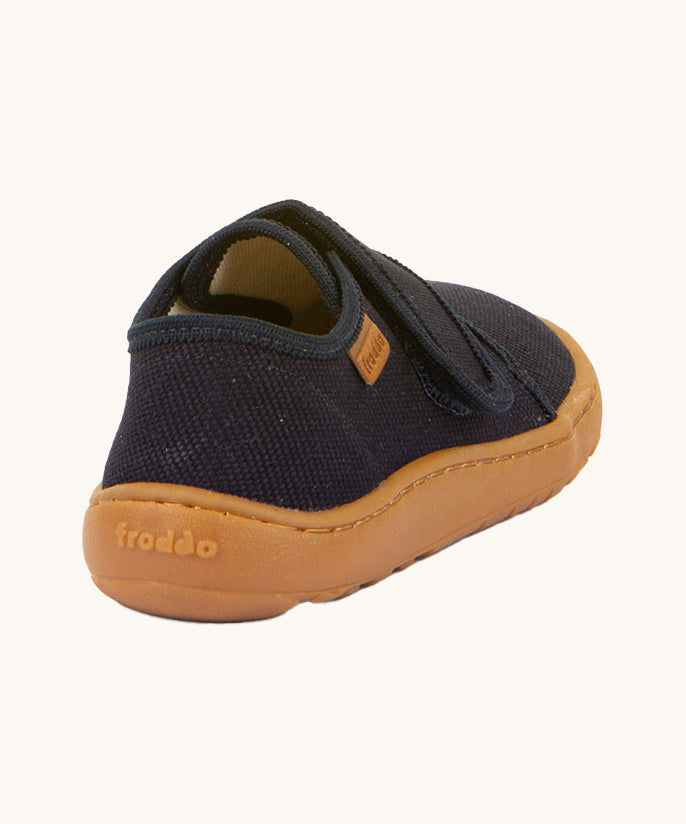 The back of the Froddo barefoot kids slipper in dark blue available at Babipur showing the branding detail on the sole