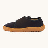 A side image of the Froddo barefoot kids slipper in dark blue available at Babipur showing the velcro fastener detail