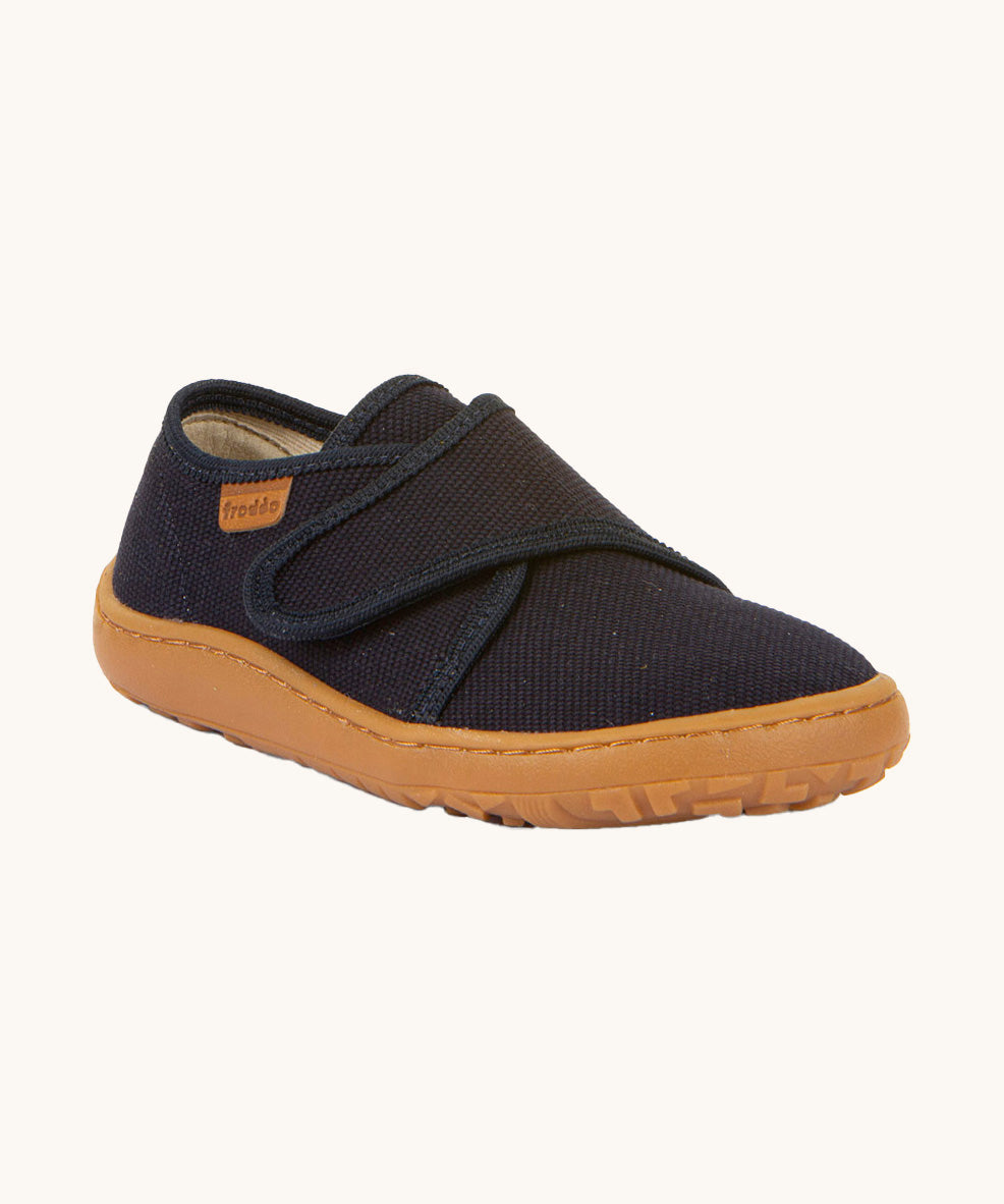 Froddo barefoot kids slipper in dark blue available at Babipur. A canvas style slipper shoes with a velcro fastener for a secure fit and a dark brown grippy sole