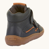 The back of a Froddo barefoot Autumn children's shoe in navy available at Babipur showing the padded ankle and the dark brown grippy sole detail