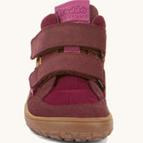 The front of the Froddo barefoot tex kids autumn shoes in bordeaux pink available at Babipur showing the 2 velcro straps on the front and grippy sole detail