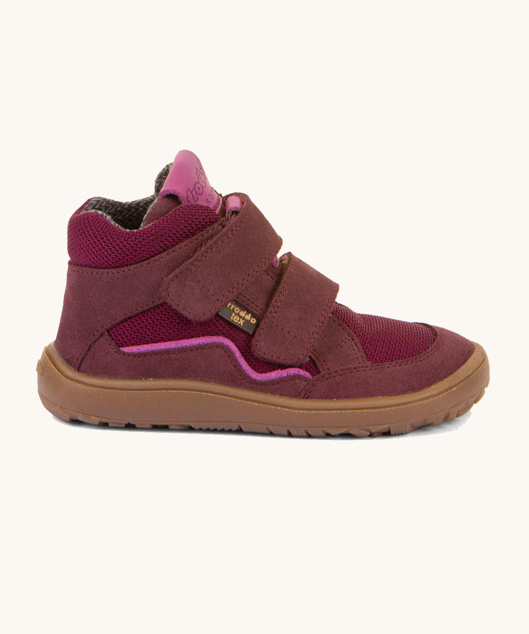 A side image of the Froddo barefoot tex kids autumn shoes in bordeaux pink available at Babipur showing the 2 velcro straps and brown grippy sole detail