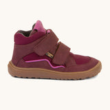 A side image of the Froddo barefoot tex kids autumn shoes in bordeaux pink available at Babipur showing the 2 velcro straps and brown grippy sole detail
