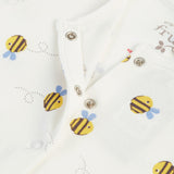 A closer look at the popper fastners on the babygrow from the  Frugi Baby Muslin Gift Set - Buzzy Bee