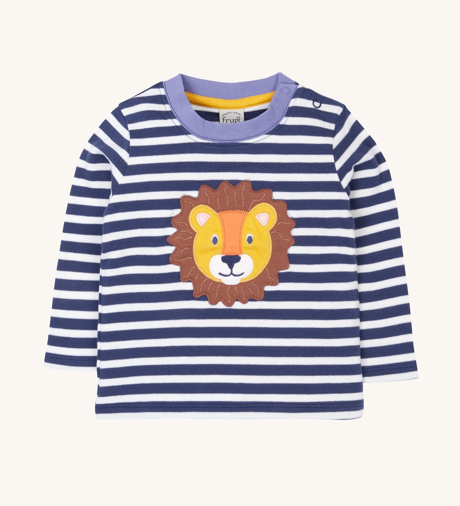 Frugi discovery applique top in stripe/Lion available at Babipur. A blue and white striped GOTS organic top with long sleeves and a cute lion's head applique on the front. Features popper fasteners on the shoulder.