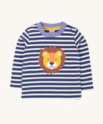 Frugi discovery applique top in stripe/Lion available at Babipur. A blue and white striped GOTS organic top with long sleeves and a cute lion's head applique on the front. Features popper fasteners on the shoulder.