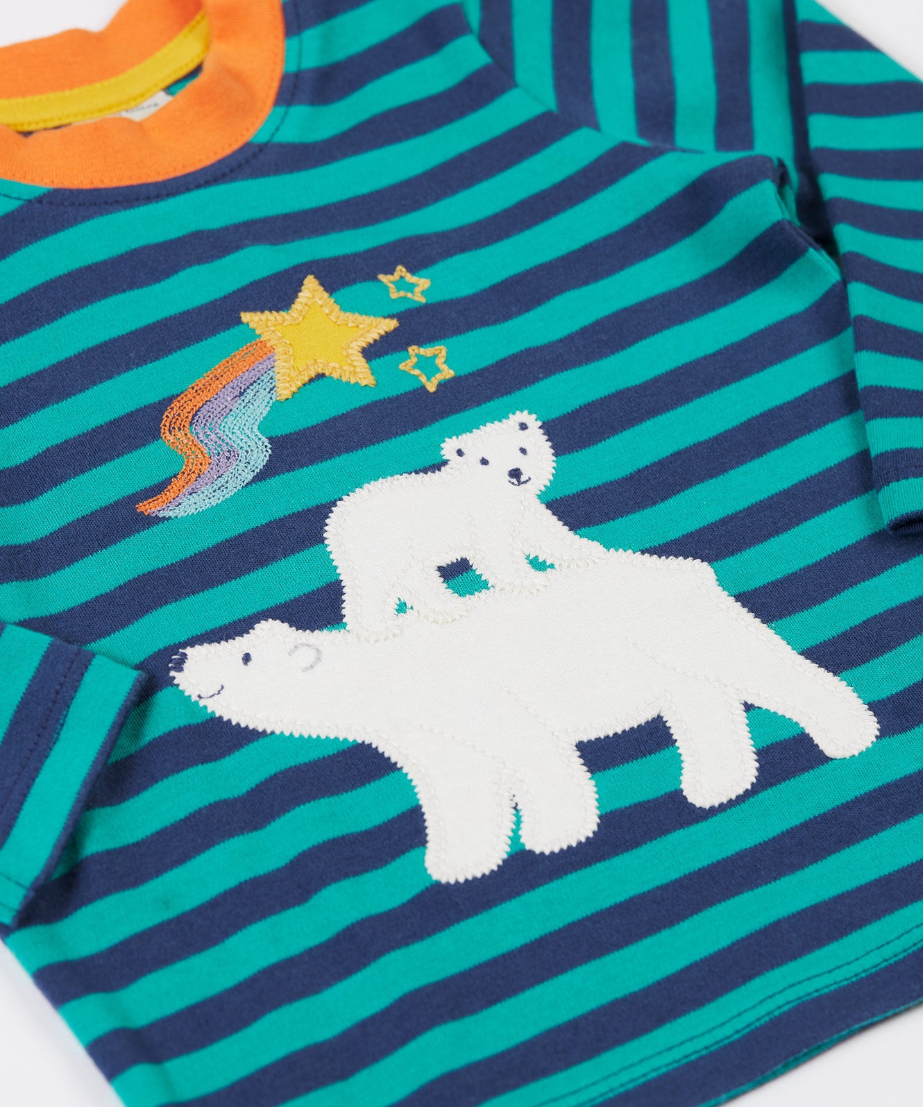 A close up of the polar bear applique on the Frugi discovery applique top in stripe/polar bear available at Babipur.