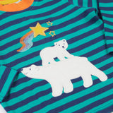 A close up of the polar bear applique on the Frugi discovery applique top in stripe/polar bear available at Babipur.