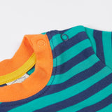 A close up of the popper fastner on the shoulder on the Frugi discovery applique top in stripe/polar bear available at Babipur.