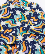 a close up of the Frugi Magic Skies Organic Cotton Cosy Skater Dress. This party dress is a part of a wide range of organic cotton clothing for children available here at Babipur.