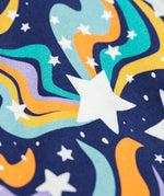 A close up of the print on theFrugi Magic Skies Organic Cotton Cosy Skater Dress. This party dress is a part of a wide range of organic cotton clothing for children available here at Babipur.