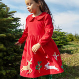 Child wearing Frugi Peony Corduroy Dress Red Robin - a Christmas party dress made from GOTS organic cotton - available at Babipur.