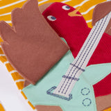 A close up of the Frugi Gold Rockin' Robin Summit Circular Organic Cotton Top available at Babipur showing the wing detail on the robin applique
