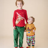 A boy wearing the Frugi Berry Red Reindeer Terrific Circular Organic Cotton long sleeved kids top standing next to a small child wearing the gold stripe robin appliqué top. These tops are both available at Babipur.