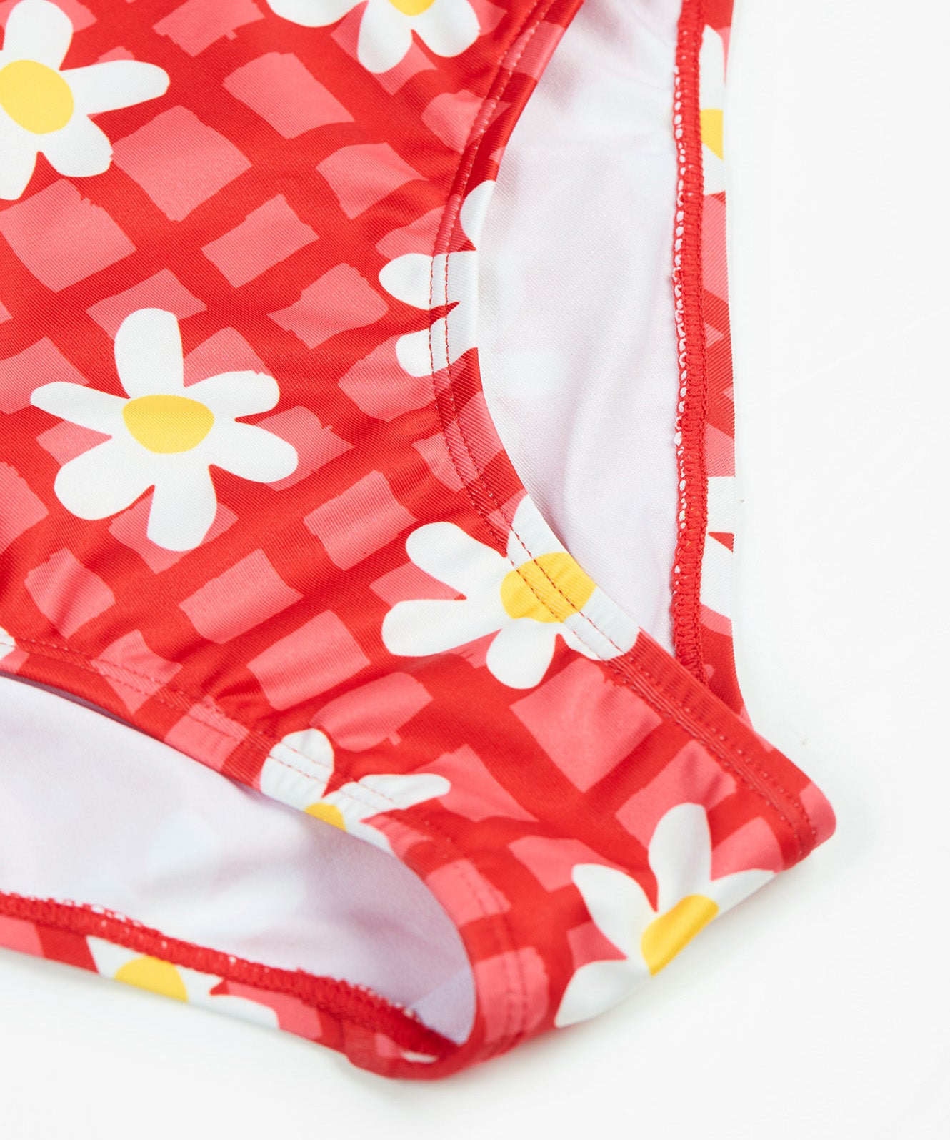 Frugi kids coral swim suit in check and daisy chain