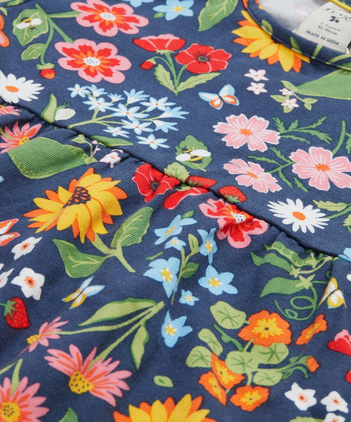 Frugi navy dress potager garden design print detail