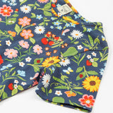 Frugi navy skater dress potager garden arm and neck detail