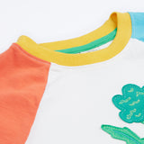 Frugi white short sleeve top, blue and red sleeves veg patch neck detail