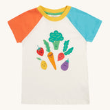Frugi white short sleeve top, blue and red sleeves veg patch design on a cream background