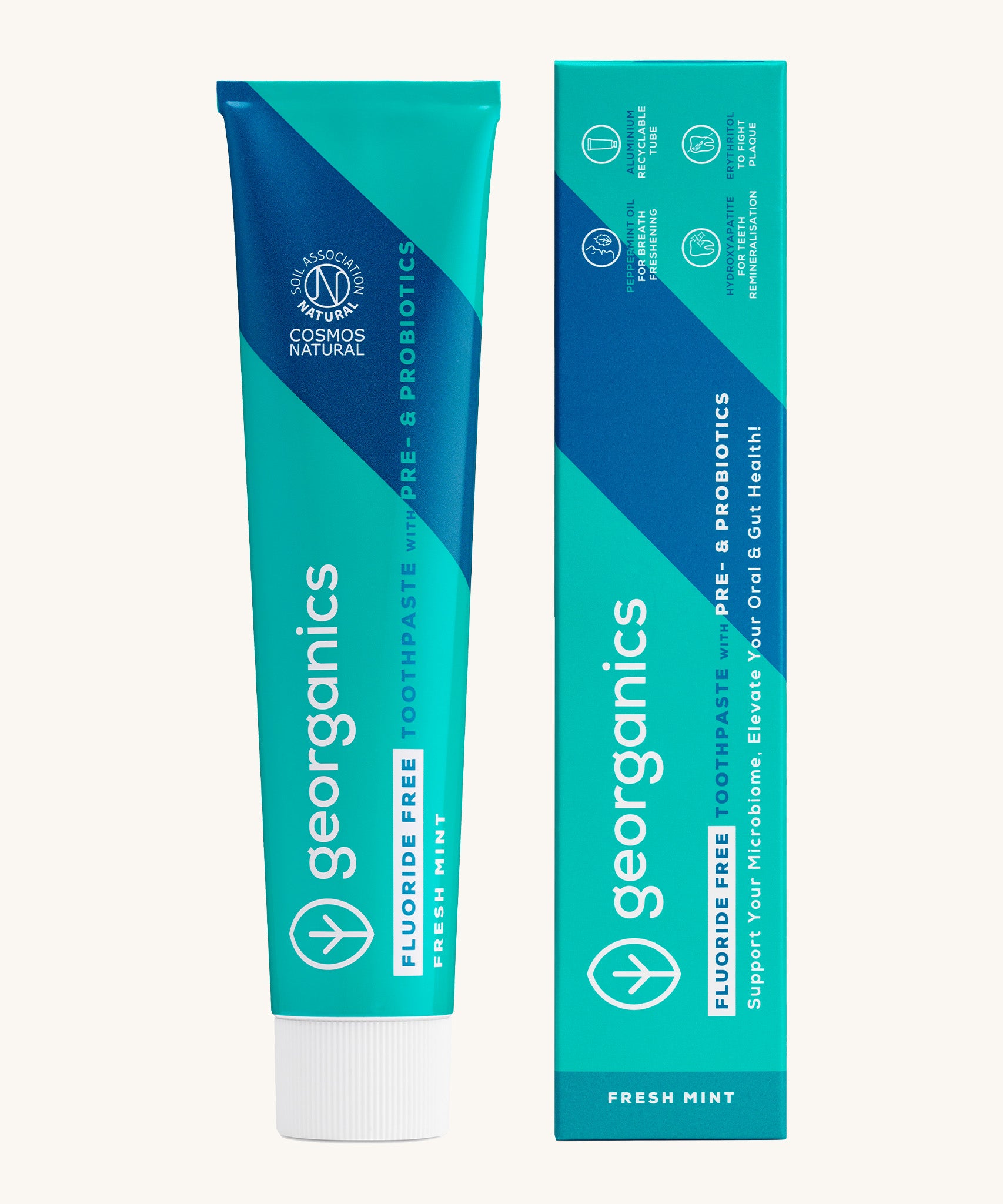 Georganics fluoride free toothpaste with pre and prebiotcs in fresh mint flavour available at Babipur standing next to the matching turquoise cardboard packaging.