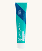 Georganics fluoride free toothpaste with pre and prebiotcs in fresh mint flavour available at Babipur. Toothpaste comes in a turquoise tube with a white lid and branding.