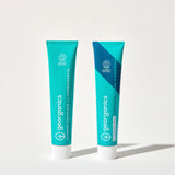 Georganics fluoride + fluoride free toothpaste with pre and prebiotcs in fresh mint flavour available at Babipur. Toothpaste comes in a turquoise tube with a white lid and branding.