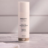 Green People Scent Free 24 Hour Cream pictured on a white tiled background
