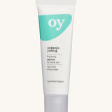 Green People OY! Organic Teen Purifying Serum - 30ml ina white tube, with a green wavy pattern on a cream background