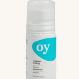 Green People OY! Organic Teen Deodorant - 75ml, is in a white roll on tube, which has a blue pattern on the front. The image is on a cream background