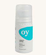 Green People OY! Organic Teen Deodorant - 75ml, is in a white roll on tube, which has a blue pattern on the front. The image is on a cream background