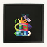 Grimm's magnetic puzzle pieces on the Grimm's Large Magnetic Board, creating a lovely piece of art work