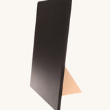 Grimm's Small Magnetic Black board is perfect for the Grimm's magnetic puzzle pieces. The board has a wooden piece at the back to allow it to stand up