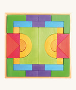 Grimm's Basic Building Set is a set of colourful wooden blocks in different shapes and sizes, in a wooden tray.