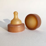 Hevea Wide Neck Glass Baby Bottle Natural Rubber Cap and a Natural Rubber Nipple