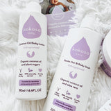 Kokoso unscented gentle hair & body wash lying next to the Kokoso coconut oil Baby lotion, both available at Babipur.