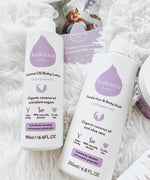 Kokoso unscented gentle hair & body wash lying next to the Kokoso coconut oil Baby lotion, both available at Babipur.