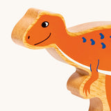 A close up of the chunky wooden Lanka Kade orange Hysilophodon dinosaur figure available at Babipur.