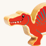 A close up of the chunky wooden Lanka Kade red Spinosaurus figure available at Babipur.