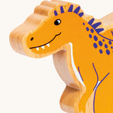 A close of the chunky wooden Lanka Kade yellow Becklespinax dinosaur figure available at Babipur.
