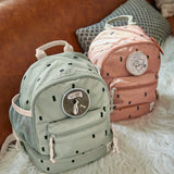 Lassig kids mini caramel and olive pattern backpacks available on Babipur. A pale pink and green backpack with cute patches on the front panel. Features padded shoulder straps, mesh side pockets and 3 zipped compartments.